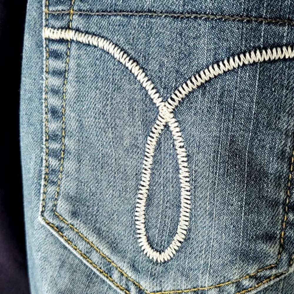 Calvin Klein Low Rise Flared Jeans - Picture 8 of 8